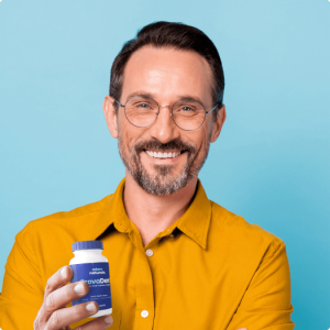 Man Holding Provadent Bottle Supplement
